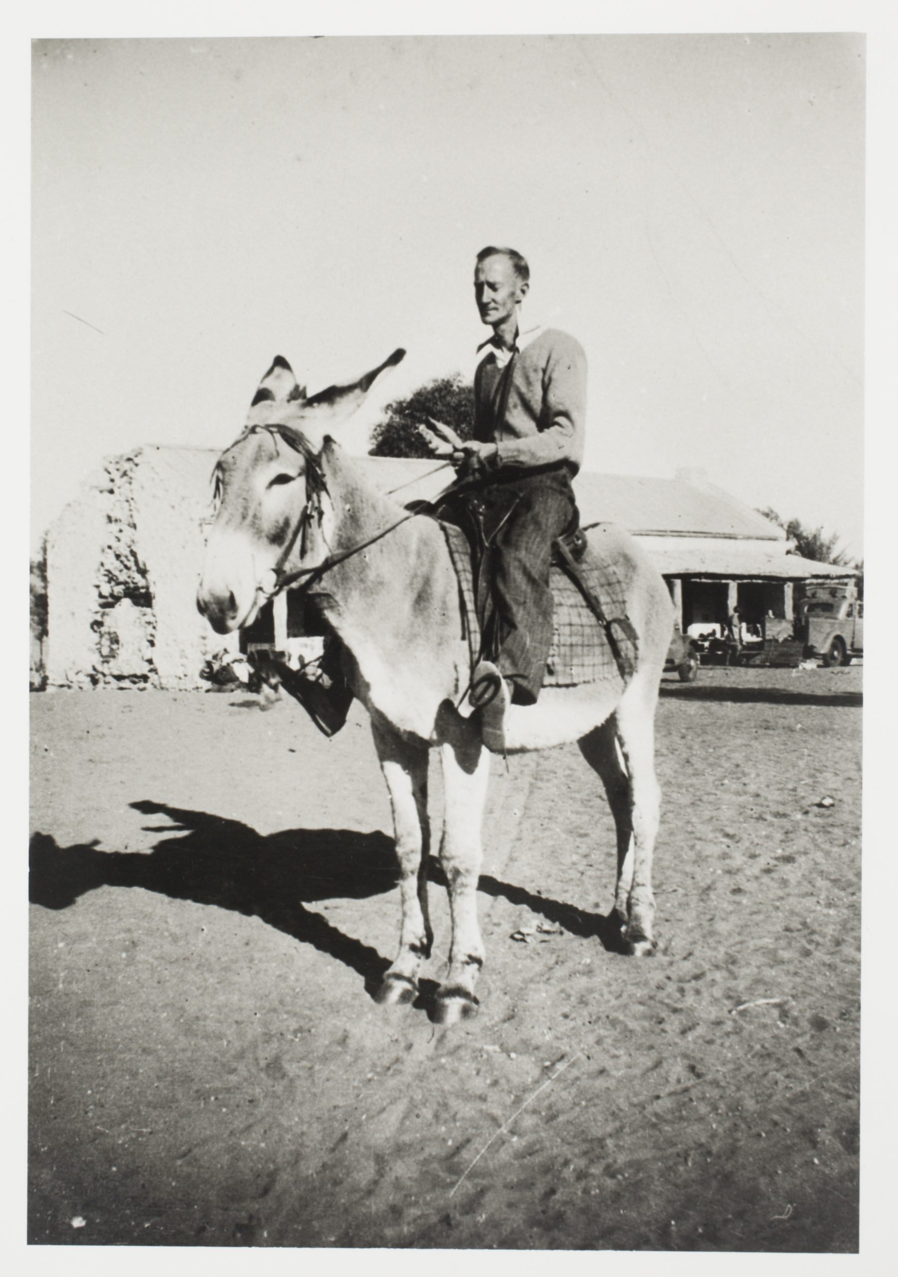 1937 – Father Smith on Donkey at the Bungalow